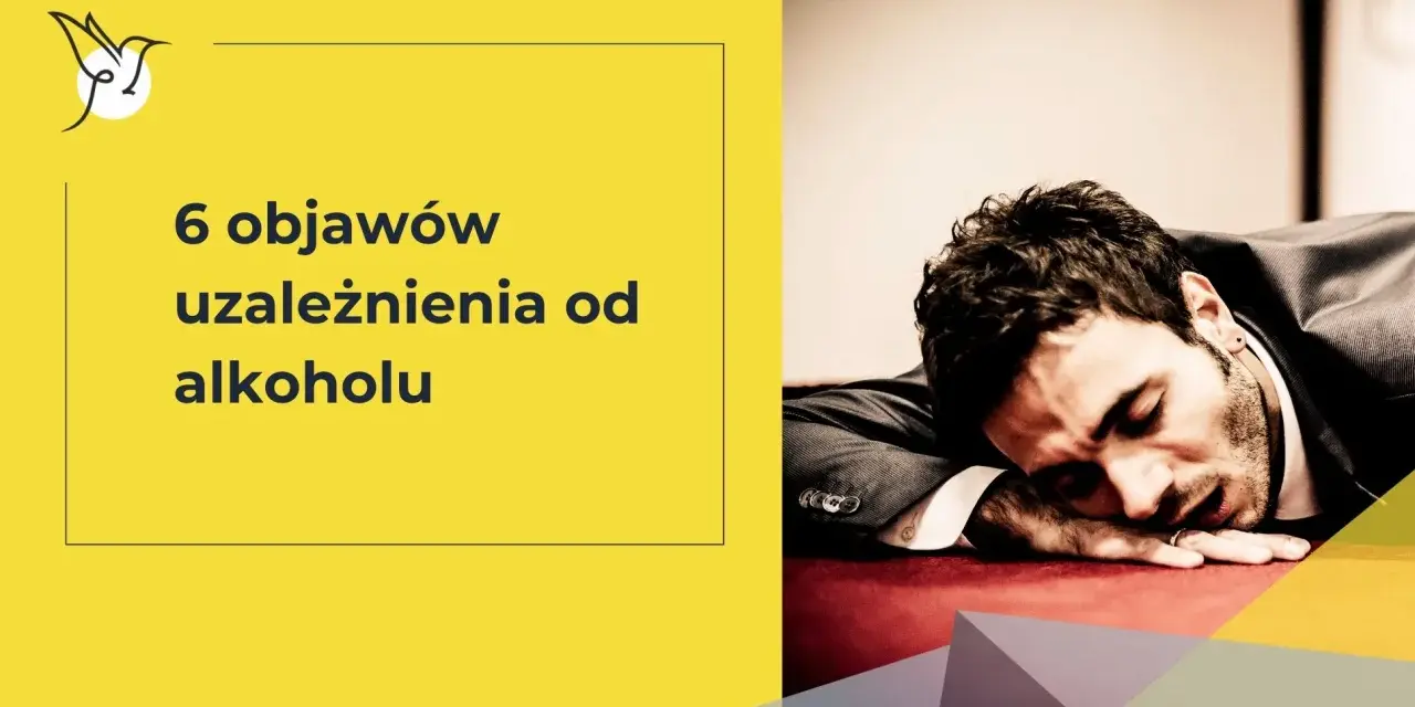 6 objawów uzależnienia od alkoholu. Mężczyzna w garniturze śpi na stole, wyczerpany.
