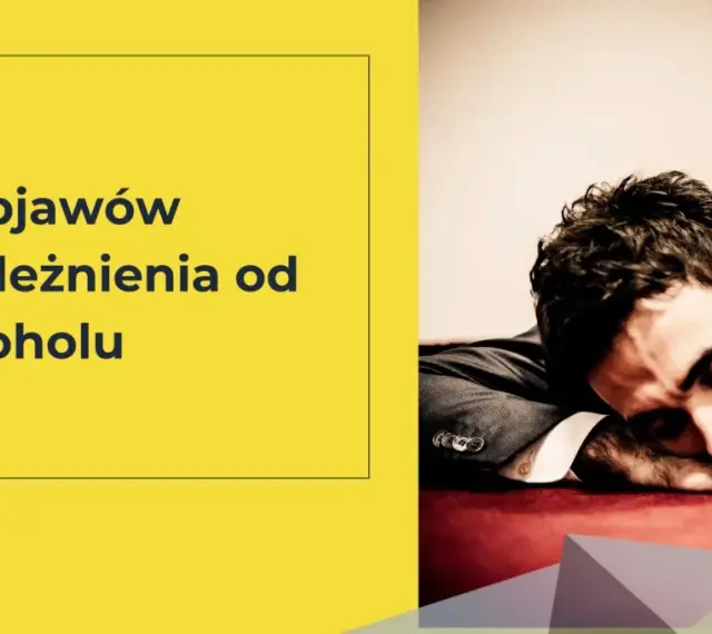6 objawów uzależnienia od alkoholu. Mężczyzna w garniturze śpi na stole, wyczerpany.